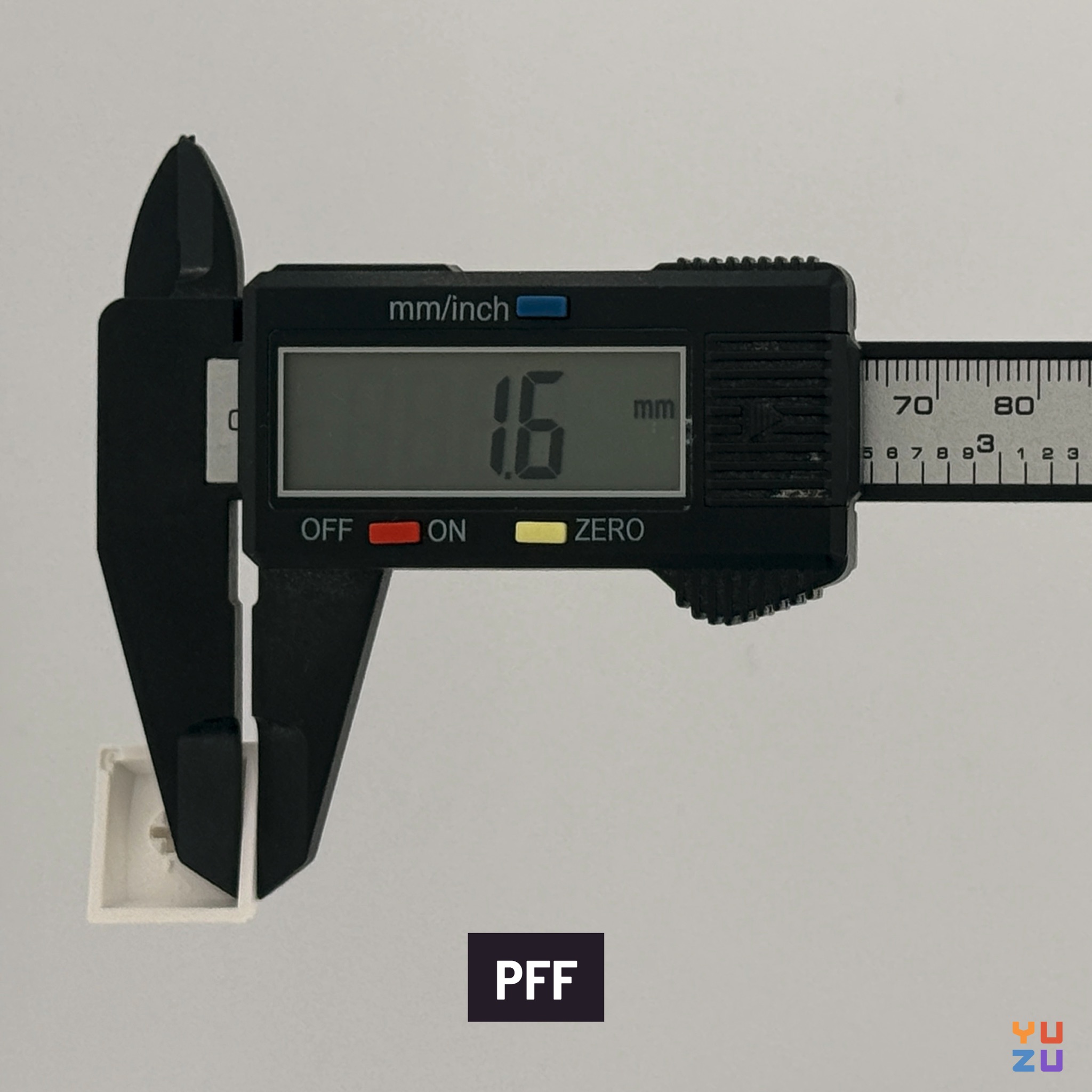 Caliper measuring the wall thickness of PFF keycaps